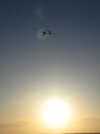 SX22365 RC plane flying into sunset.jpg